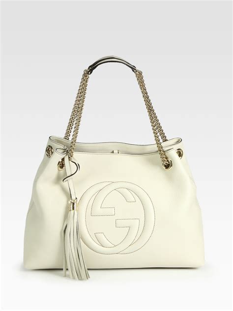 set regalo gucci|white gucci bag.